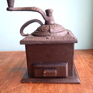 Vintage Wooden Coffee Grinder: Traditional Hand Crank Mill.