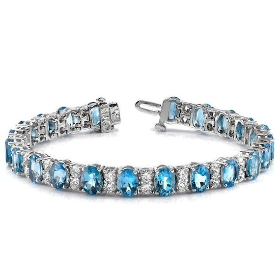 Swiss Blue Topaz Tennis Bracelet With Diamonds (17 Ctw)