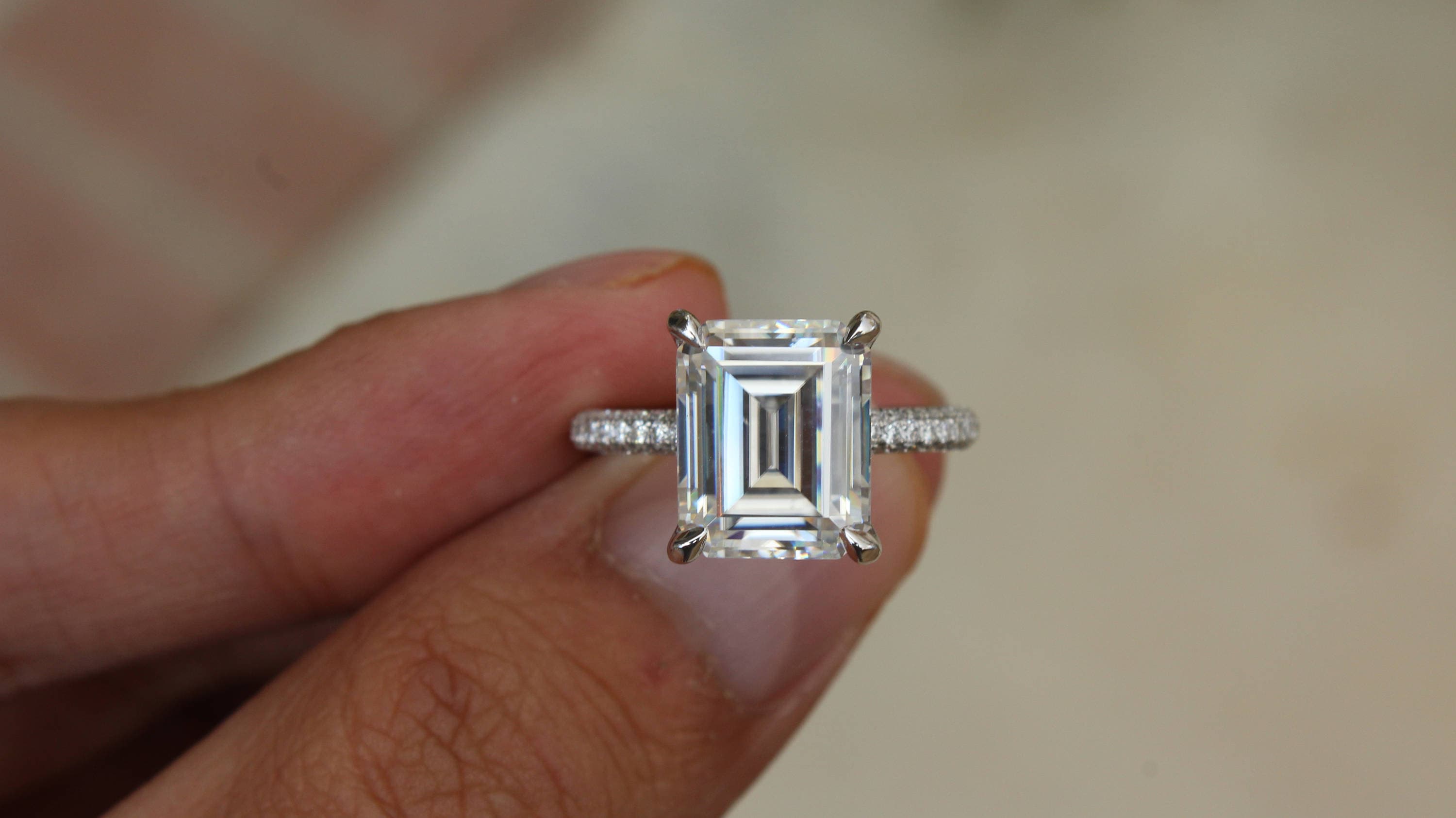 4 carat emerald cut diamond ring