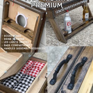 May include: A wooden cornhole game with a scoreboard, drink holders, LED lights, and a compartment for bean bags. The game is labeled "The Works Premium" and has numbers 1 through 19 on the side. The game also has two black handles.