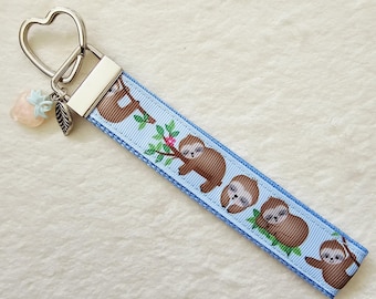 Sloth Heart Key Fob Wristlet: Blue Webbing with Strawberry Charm