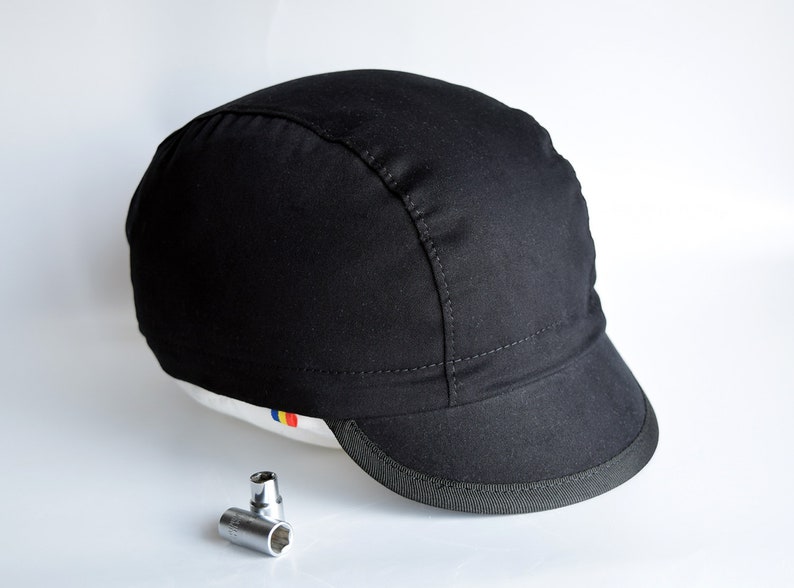 All black cycling cap. Cotton cycle hat with city state name on the brim image 6