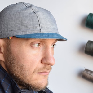 Light grey and teal cap, Short brim classical 3 panel