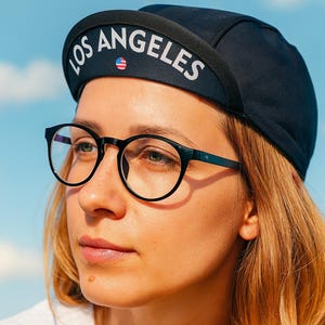 Custom cycling cap with city (state) name on the brim