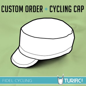 May include: A white cycling cap with a black outline. The cap has a flat brim and a curved crown. The text "CUSTOM ORDER * CYCLING CAP" is at the top of the image. The text "FIDEL CYCLING" is at the bottom left of the image. The text "TURIFIC!" is at the bottom right of the image.
