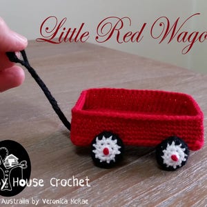 Virkat mönster för en liten röd vagn för Cubby House-dockor (amerikanska termer)