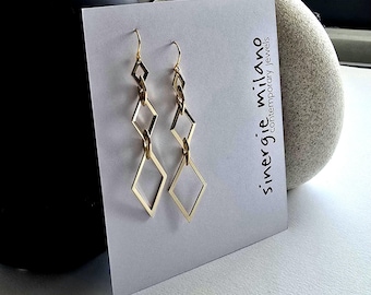 Long geometric earrings, gold-plated brass. Elegant and sophisticated.