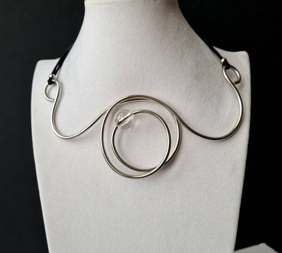 Extravagant silver necklace, contemporary style, art to wear. Necklace with pearl. Modern jewelry. Bold and elegant.