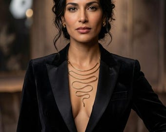 Large geometric snake necklace, minimal and contemporary, in light gold-plated brass. Ironic and extravagant. Bold and sensual. One of a kind!