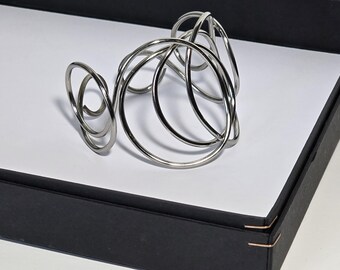 Band Bracelet. Bright, light, original and elegant. German Silver (Alpacca) plated White Bronze: glacial light!