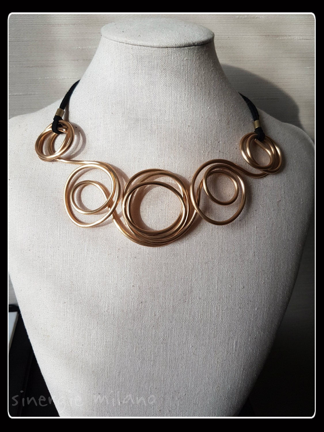 Goldcoloured brass necklace, roundneck, brass jewellery, contemporary