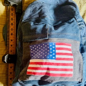Upcycled denim backpack made from jeans.  OOAK with an American flag.