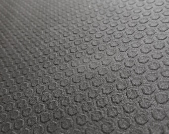 Neopreno con relieve hexagonal de 2 mm: material para traje de buceo negro