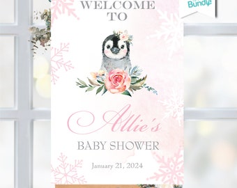 May include: A baby shower welcome sign featuring a watercolor penguin with a floral crown. The sign has a pink and white snowflake design, with the text "Welcome to Allie's Baby Shower" and the date January 21, 2024.