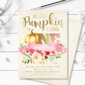 May include: A birthday invitation with a gold and pink theme. The text "OUR LITTLE Pumpkin IS TURNING ONE" is displayed above a watercolor pumpkin and floral arrangement. The invitation includes the name "Emmy Richards" and event details.
