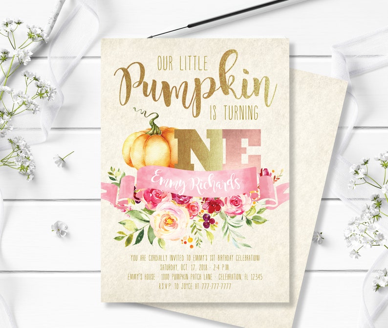 May include: A birthday invitation with a gold and pink theme. The text "OUR LITTLE Pumpkin IS TURNING ONE" is displayed above a watercolor pumpkin and floral arrangement. The invitation includes the name "Emmy Richards" and event details.