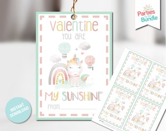 Może przedstawiać: Drukowana kartka walentynkowa z akwarelową ilustracją jednorożca z tęczą i balonami na gorące powietrze. Kartka zawiera napis "Valentine You Are My Sunshine" z miejscem na dopisanie "From:".