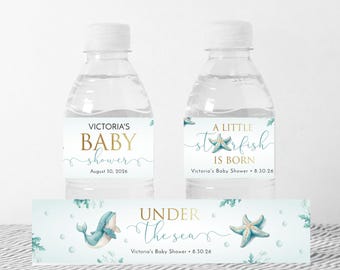 May include: Water bottle labels for a baby shower with an under the sea theme. The labels feature a blue whale, starfish, and the text "Victoria's Baby Shower - 8.30.26" and "Under the Seas".