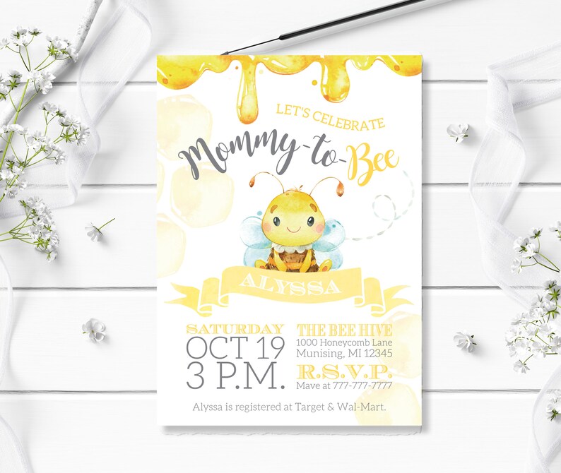 May include: A yellow and white baby shower invitation featuring a cartoon bee and the text "Let's Celebrate Mommy-to-Bee". The invitation includes the date, time, and location of the event. It also includes the text "R.S.V.P. Mave at 777-777-7777".