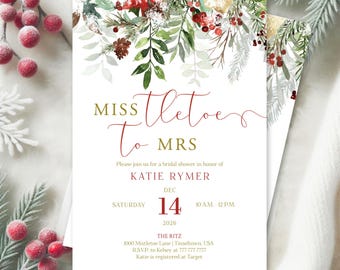 May include: A white bridal shower invitation with a watercolor design of red berries, green leaves, and pine branches. The text reads "Miss To Mrs Katie Rymer" with the date "December 14, 2026" and the time "10 AM - 12 PM".
