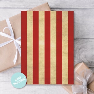 Puede incluir: Papel de regalo a rayas rojas y beige con un aspecto desgastado y vintage. Se incluye la parte posterior del papel.