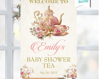 Może przedstawiać: Zaproszenie na Baby Shower Tea Emily z różowo-złotym czajnikiem i filiżanką do herbaty z kwiatowymi akcentami. Data: 20 maja 2023.