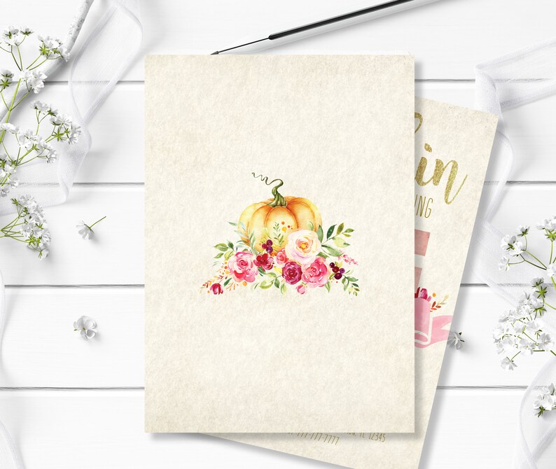 May include: Watercolor design of a pumpkin with a green stem and floral arrangement of pink, red, and cream-colored roses and leaves. The pumpkin is on a cream-colored card. A second card is partially visible with gold text.