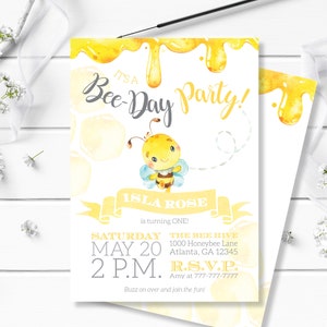 May include: A yellow and white bee-themed birthday party invitation with a cartoon bee and the text "It's a Bee-Day Party!"  Isla Rose is turning one. The party is on Saturday, 20th May at 2 p.m. at The Bee Hive, 1000 Honeybee Lane, Atlanta, GA 12345. RSVP to Amy at 777-777-7777.  Buzz on over and join the fun!