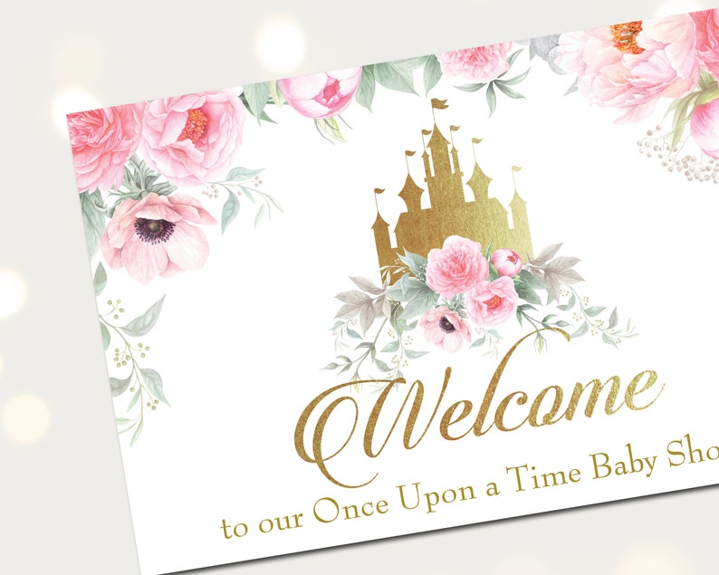 Puede incluir: Un cartel de bienvenida con un castillo dorado y flores rosas. El texto dice "Bienvenido a nuestro Baby Shower Once Upon a Time".