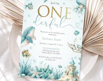 May include: A blue and green invitation for a first birthday party with a nautical theme. The invitation features a whale, a turtle, a starfish, and a seashell. The text on the invitation reads "Isn't he ONEderful" and includes the name "Zachary Taylor", the date "Saturday August 30", the time "2 p.m.", the address "1000 Sandcastle Lane, Virginia Beach, VA 12345", and the RSVP information.