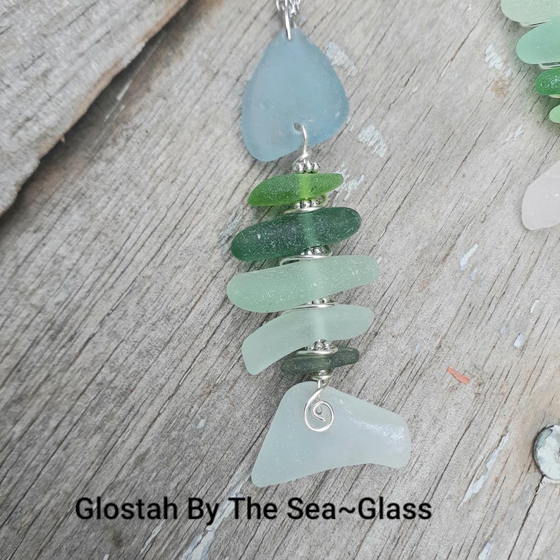 Authentic seaglass filled and wired to resemble a fish bone fish.