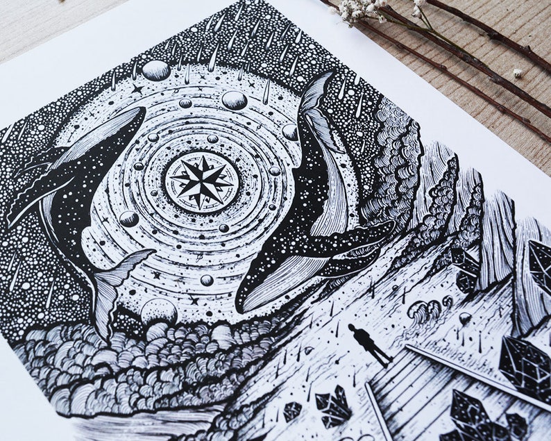 May include: Black and white illustration of two whales swimming in a starry sky with a compass in the center. The whales are surrounded by a swirling galaxy of stars and planets. The image is set against a backdrop of a rocky shore with a lone figure standing on a wooden platform.