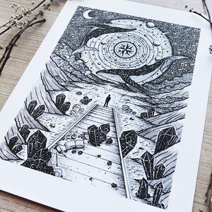 May include: Black and white illustration of a person standing on a path leading up to two whales swimming in the sky. The whales are surrounded by stars and a compass. The path is lined with crystals.