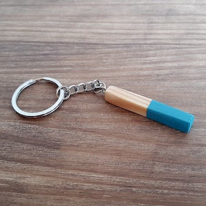 Customized wooden keychain in Scandinavian style and minimalist design, Perfect for business or anniversary gifts