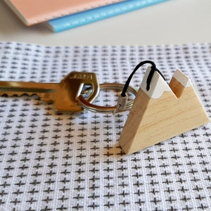 Natural wooden mountain keychain with snowy peaks. Perfect as a gift for hikers and nature lovers image 6