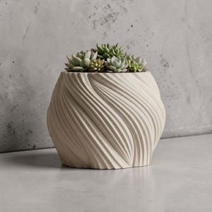 May include: A cream-colored, textured ceramic planter with a swirling design, filled with small green succulents. The planter has a rounded shape and sits on a light-colored surface, creating a modern, minimalist aesthetic.