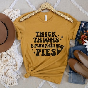 Funny Thanksgiving Shirt, Thick Thighs and Pumpkin Pies Retro Style Tee, Thanksgiving Humor, Holiday Apparel, Workout Shirt, Foodie Gift image 1