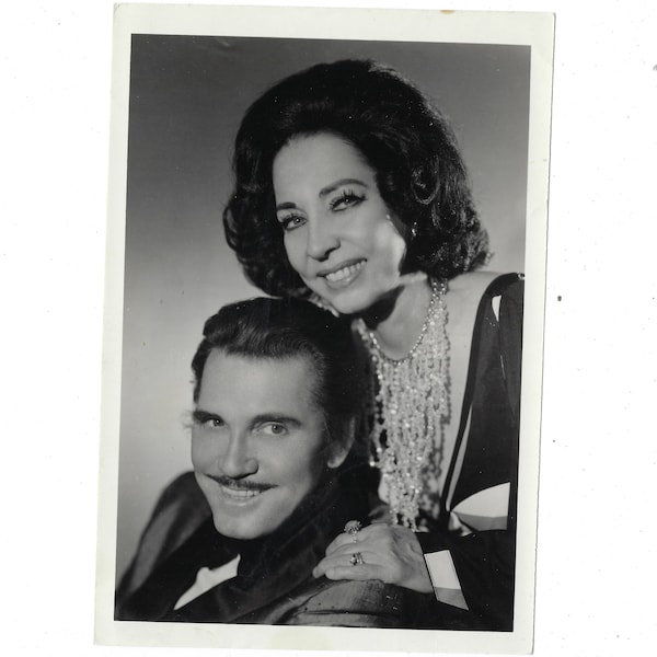 Lounge Act. Undated vintage promotional photo of a couple in flashy evening clothes.