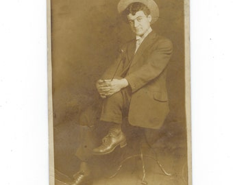 The Sassy Friend! Undated RPPC portrait of a coquettish man with a wide-brimmed hat and slender walking stick.