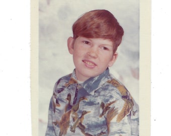 Bird-print shirt. 1970s vintage school days photo of a boy.