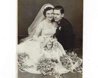 Great dress! Undated photo portrait of a bride and groom on their wedding day.