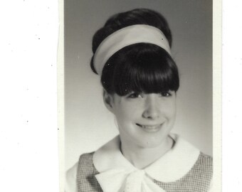 Great hairstyle! 1960s vintage school days photo of a girl.