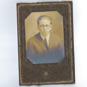 Great Glasses! Undated portrait of a handsome young man. Hammond Bros. Lewiston, ME.