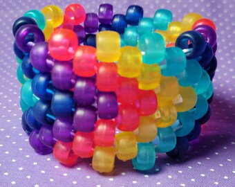 Kandi cuff bracelet, bi-pride triangles, forearm/large, pink blue purple  beads