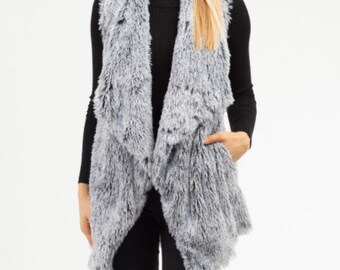 grey fuzzy vest
