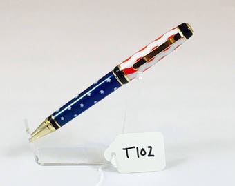Bolígrafo giratorio estilo cigarro T102, hecho a mano en cromo con acrílico rojo, blanco y azul.