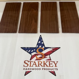 May include: Four rectangular hardwood boards with a rich, dark brown grain pattern. Below, a star-shaped logo features the American flag design and the text "STARKEY HARDWOOD PRODUCTS".