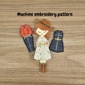 May include: Machine embroidery pattern featuring three fabric appliques. The appliques include a cowgirl doll in a daisy dress, a denim dress, and a denim jacket with jeans. The text "Machine embroidery pattern" is above the appliques.