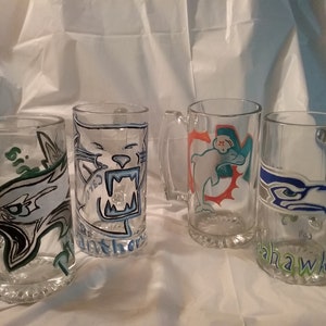 Hand painted and engraved sports teams mugs