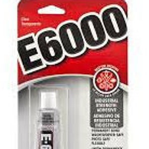 May include: A clear plastic bottle of E6000 adhesive, a strong, permanent bonding adhesive. The bottle is labeled with the product name and a red and white logo. The bottle is 0.5 fl oz (14.7 ml).